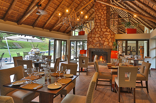 Dining room with fire place at Ivory Tree Game Lodge, Luxury Safari Accommodation in the Big Five Pilanesberg Game Reserve Pilanesberg Ivory Tree Game Lodge Big 5 Malaria Free Pilanesberg National Park South Africa