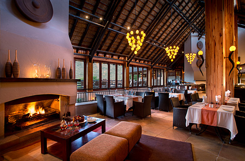 Dining area with fire place at Kwa Maritane Bush Lodge, Big 5 Pilanesberg National Park Kwa Maritane Bush Lodge Big 5 Pilanesberg National Park South Africa