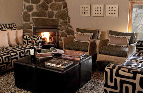 Cozy Lounge with Fireplace at Tshukudu Bush Lodge, Book your Accommodation, Big Five Pilanesberg National Park Cozy Lounge with Fireplace at Tshukudu Bush Lodge, Luxury Accommodation at Pilanesberg Game Reserve - Accommodation Bookings